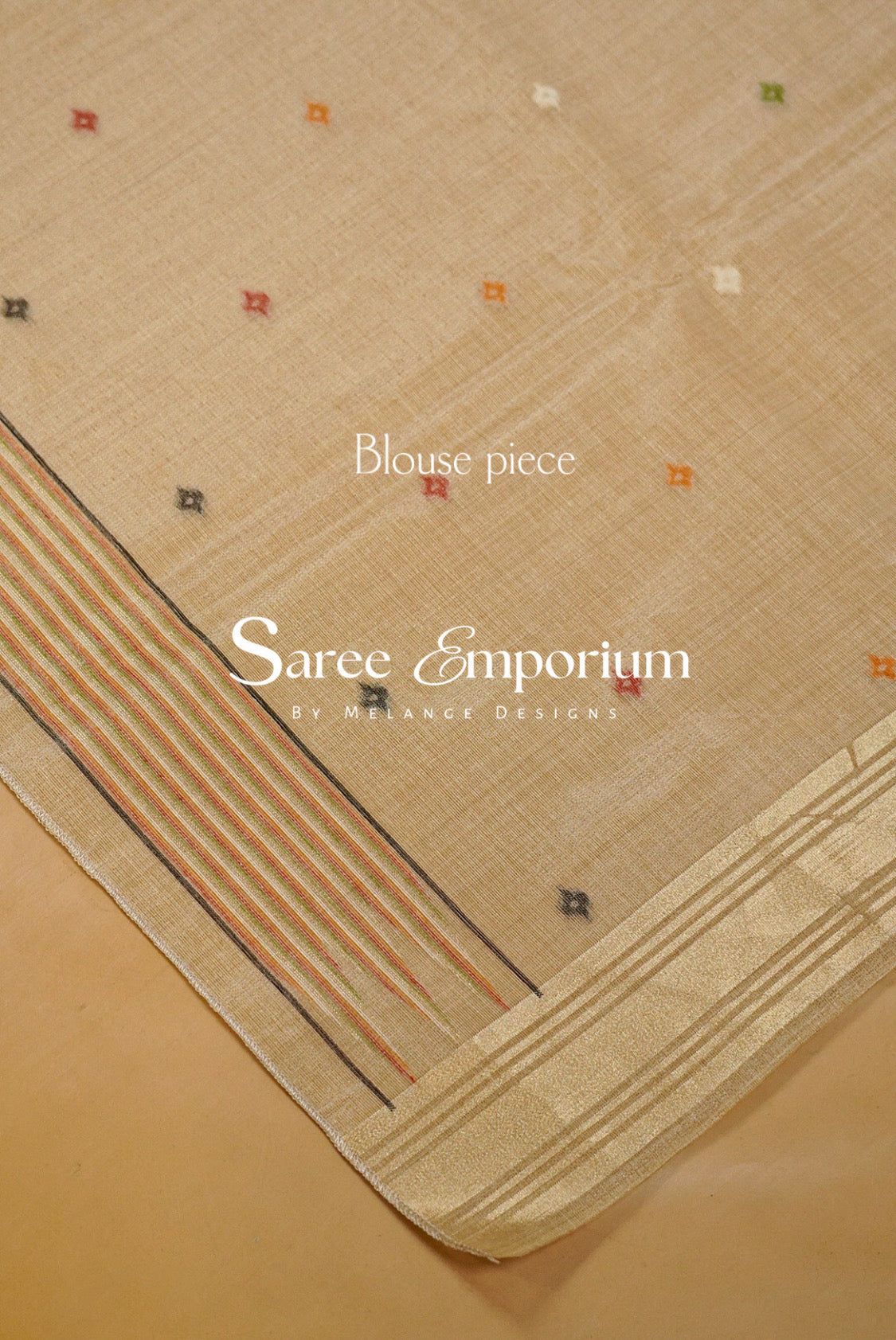 Champagne-Gold saree fabric piece with a striped border and small embroidered motifs.