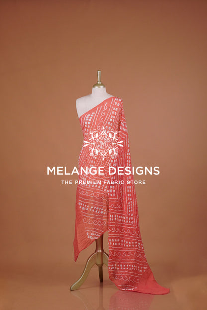 A coral pink and white patterned fabric .