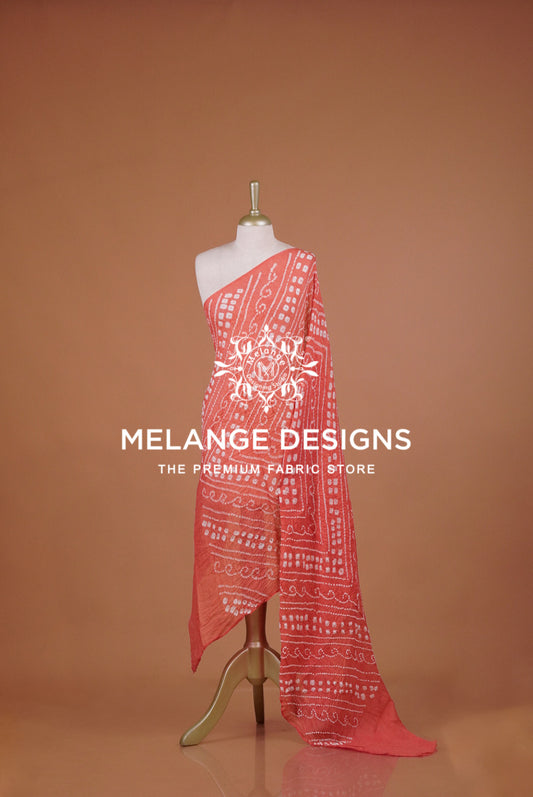A coral pink and white patterned fabric .
