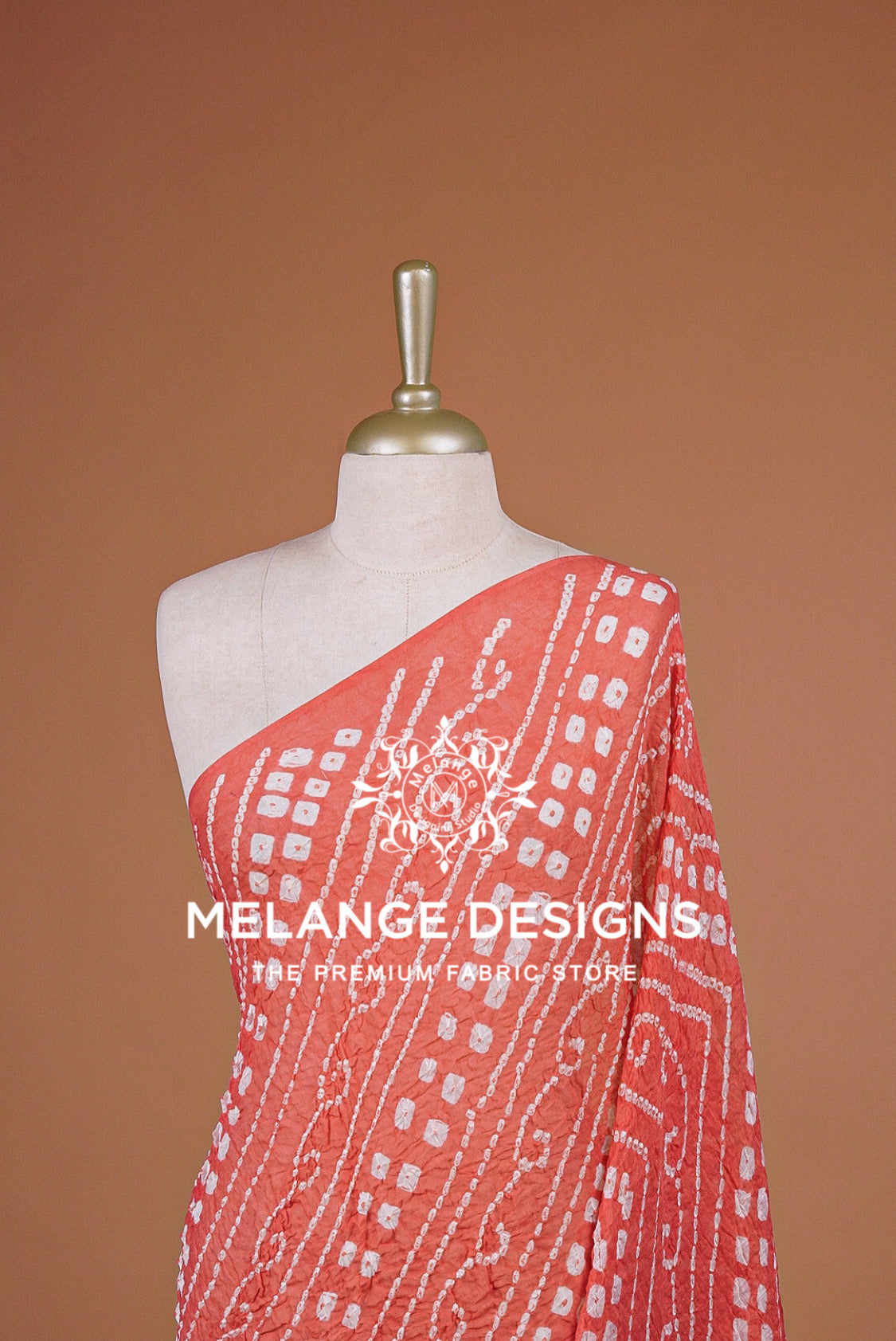A coral pink and white patterned Dupatta .