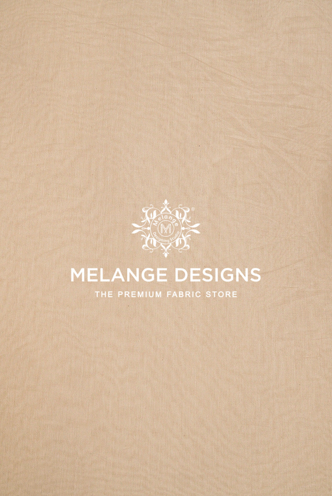 A close-up of a beige Cotton Mul Chanderi Fabric Dyeable .