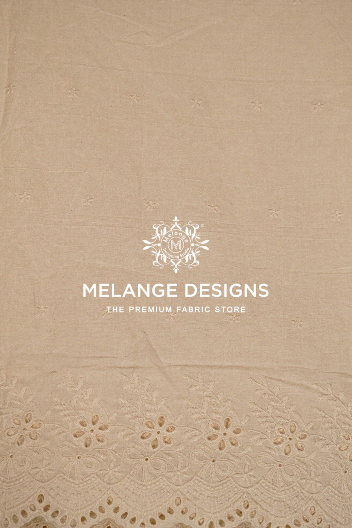 Beige cotton Cotton Plazzo Fabric Dyeable with a delicate eyelet lace border at the bottom .