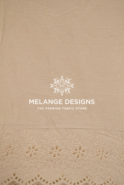 Beige cotton Cotton Plazzo Fabric Dyeable with a delicate eyelet lace border at the bottom .
