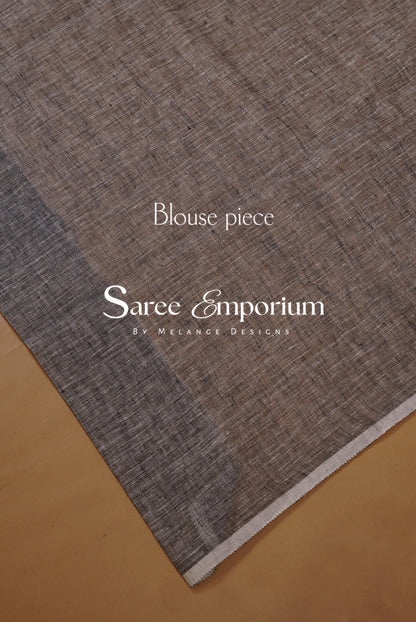 A close-up of a textured fabric swatch in a heathered taupe-brown color.