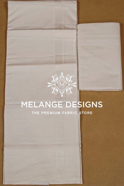 Two folded and laid-out pieces of off-white fabric .