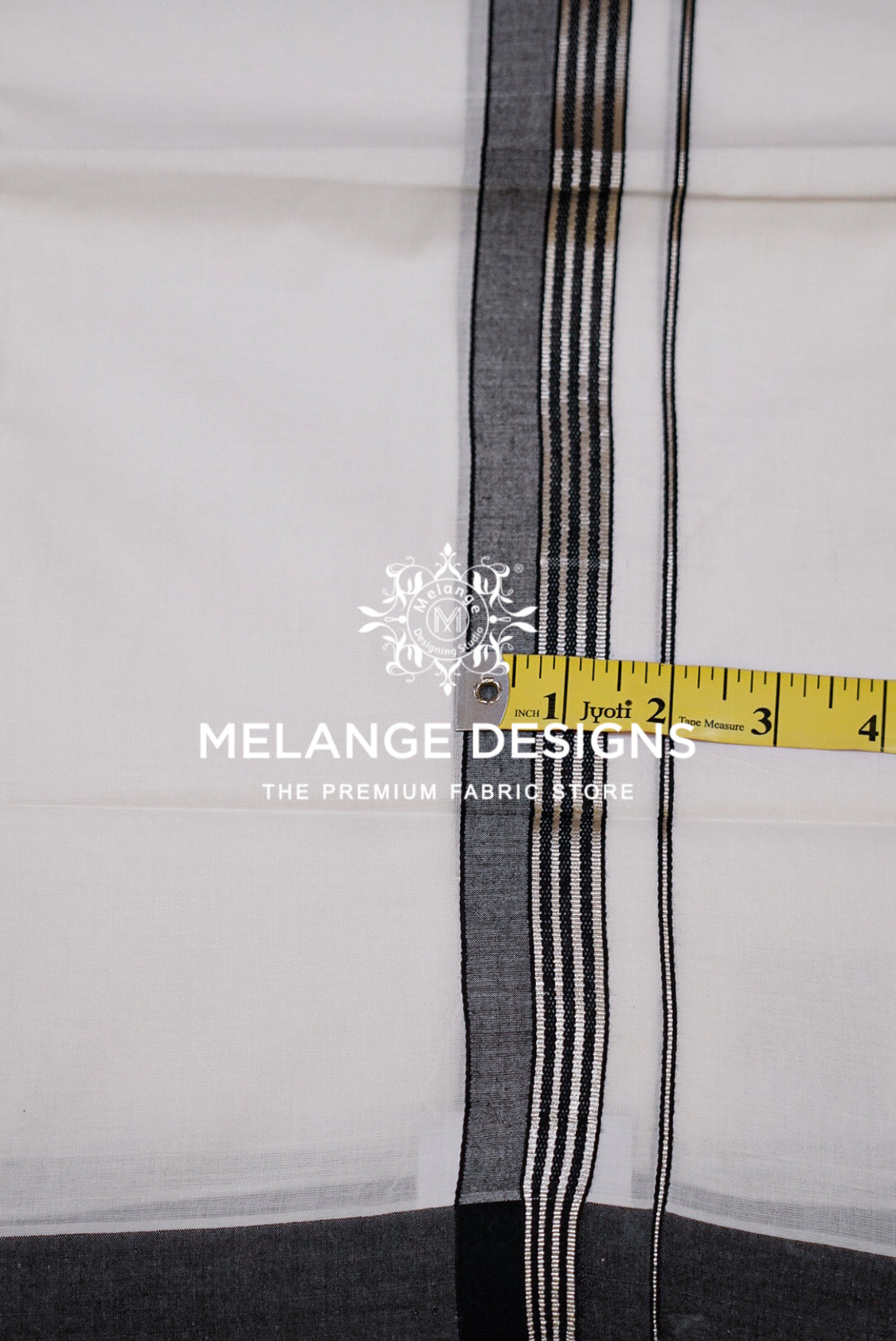 Premium Cotton Dhoti For Men White with Charcoal Grey & Black Striped Border Close Up.