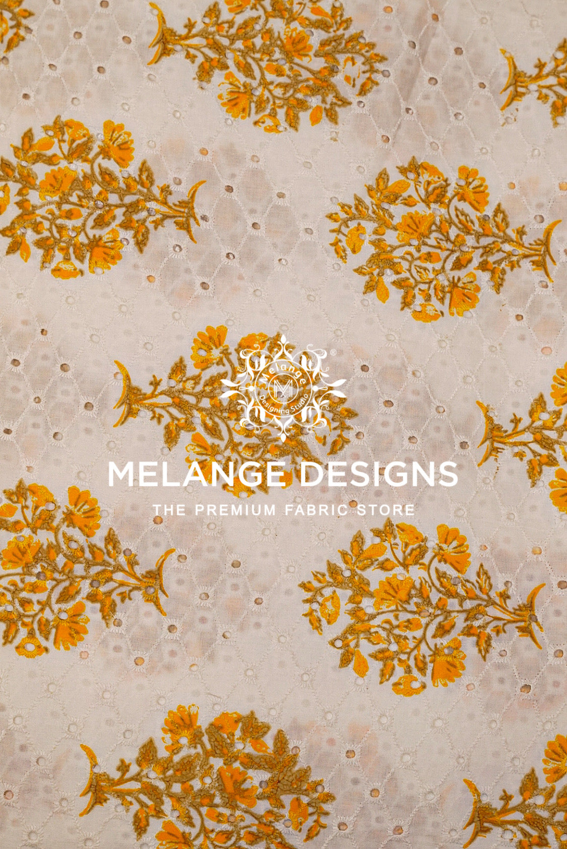 A close-up of a Printed Cotton Hacoba Fabric pattern featuring mustard yellow floral bouquets on a light beige .