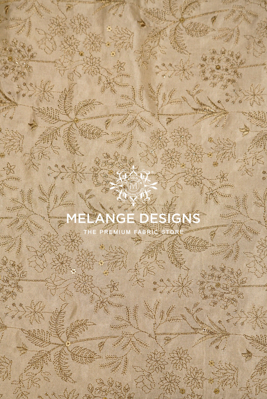 Beige Tissue Satin Embroidery Fabric Dyeable with an all-over floral and botanical pattern in a metallic gold tone.