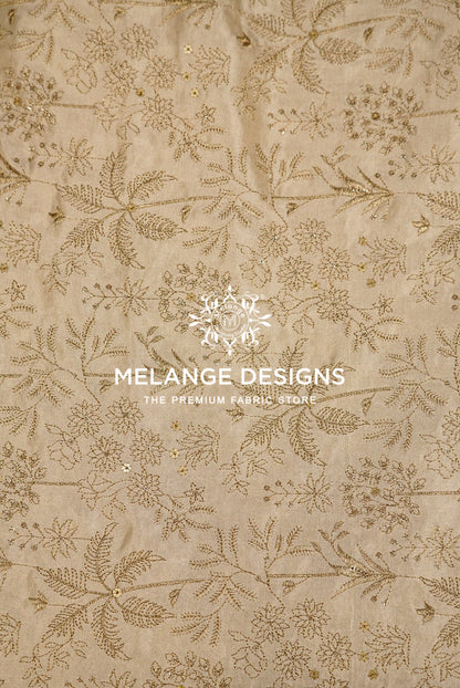 Beige Tissue Satin Embroidery Fabric Dyeable with an all-over floral and botanical pattern in a metallic gold tone.