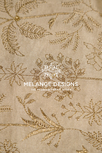 Beige linen Tissue Satin Embroidery Fabric Dyeable with gold metallic floral embroidery.