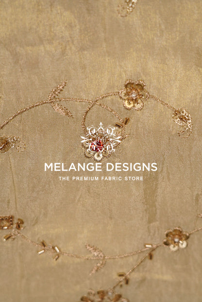 Gold floral embroidered Tissue Silk Embroidery Fabric with sequins and beadwork.