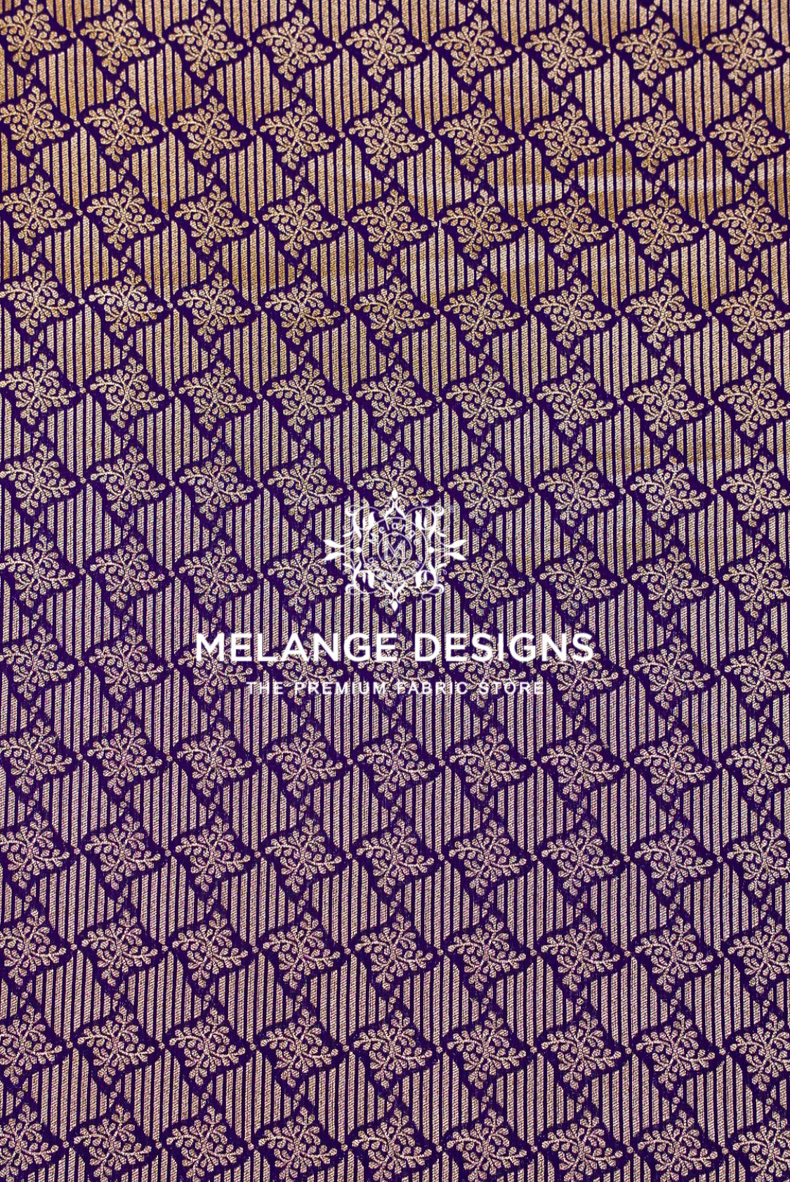 A close-up of a patterned potli bags, clutches, borders and statement panels or wallpaper sample with a repeating geometric and floral design in purple and beige.