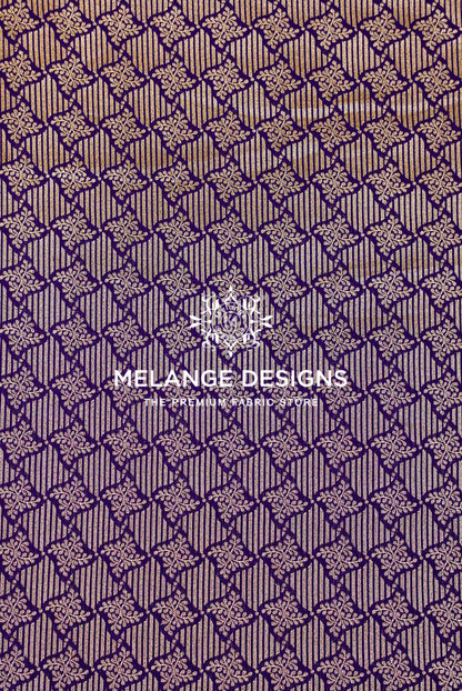 A close-up of a patterned potli bags, clutches, borders and statement panels or wallpaper sample with a repeating geometric and floral design in purple and beige.