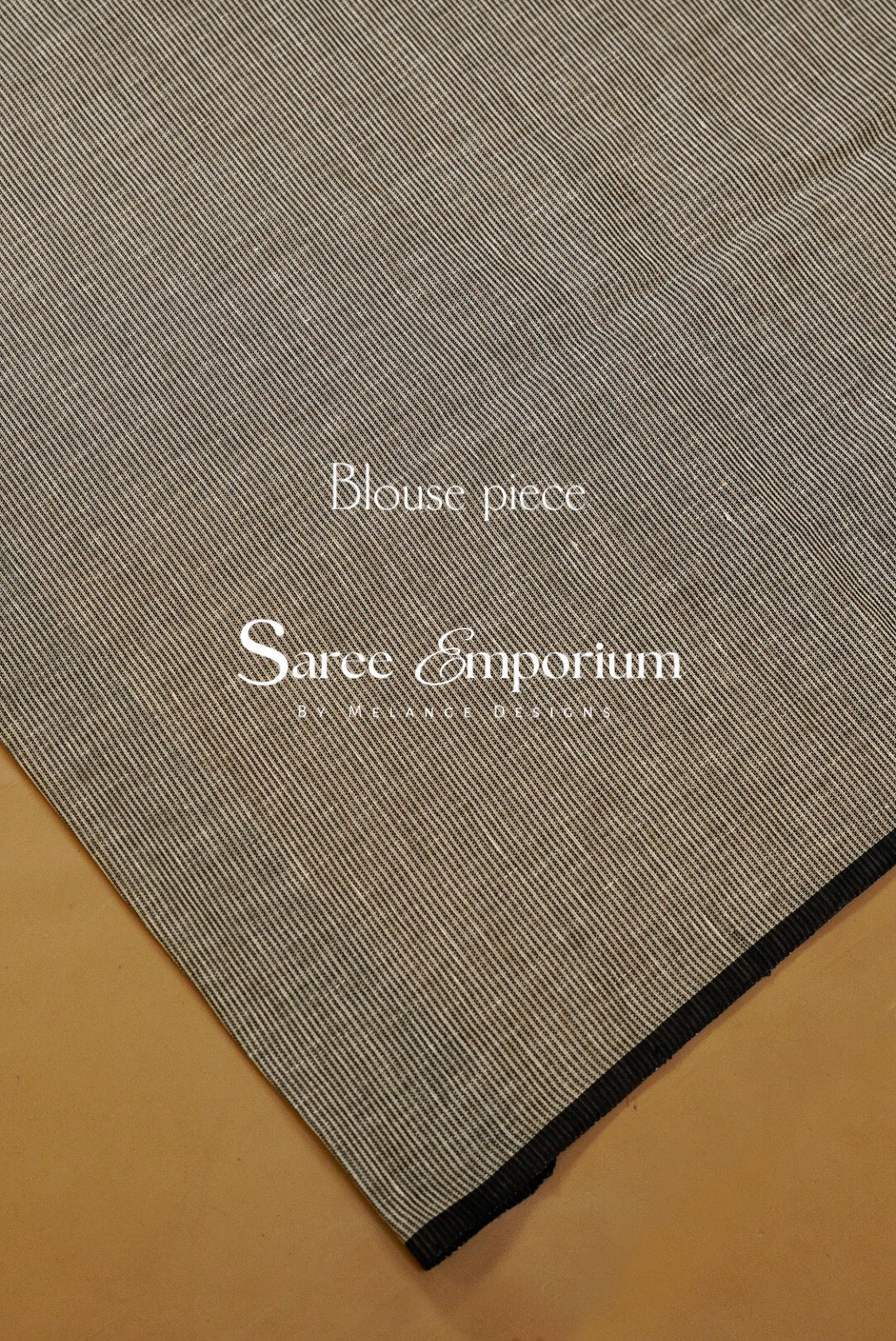 A close-up of a gray and white striped fabric.