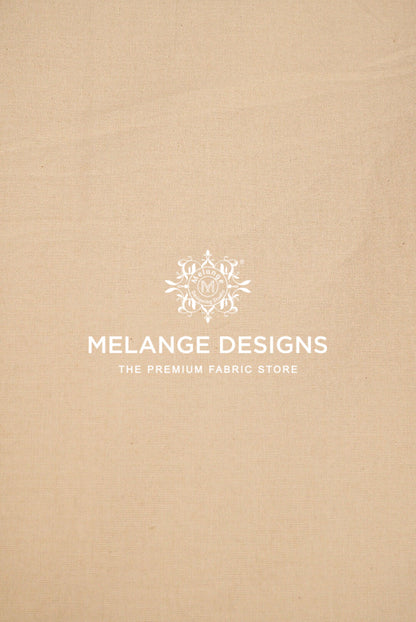 A close-up of beige Premium Cora Cotton Fabric Dyeable .