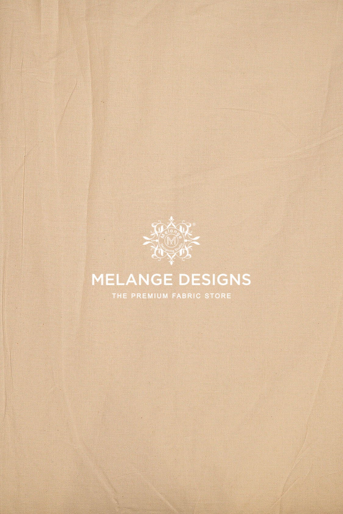 A close-up of a beige Premium Cora Cotton Fabric Dyeable surface.