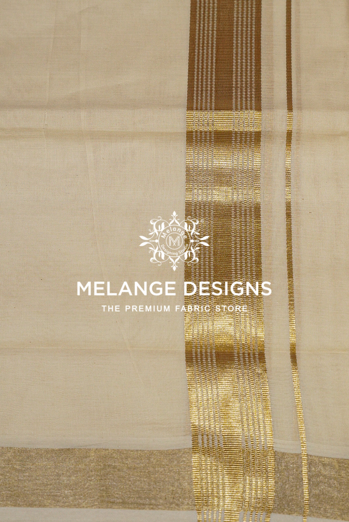 A close-up of a light beige or cream-colored fabric with a prominent metallic gold border and vertical stripes. 