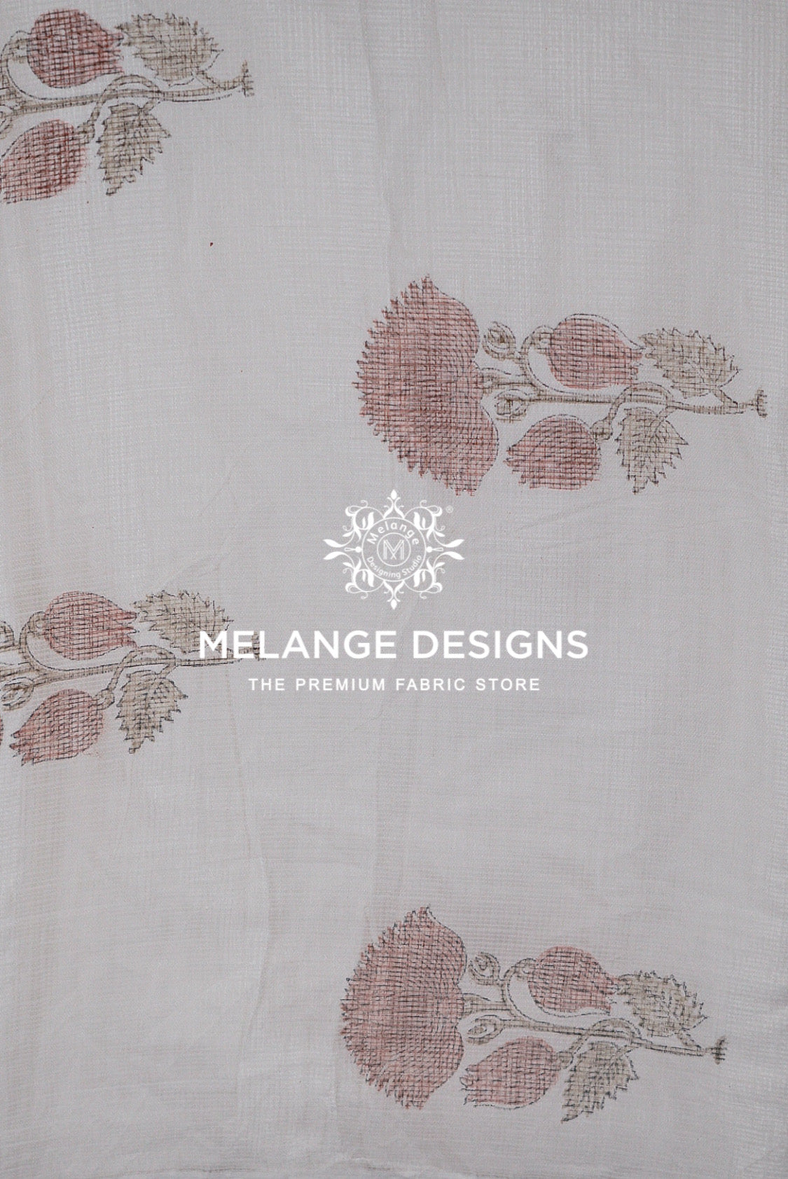 A close-up of a light beige Printed Cotton Cotta Fabric  with a repeating block-printed floral pattern in dusty rose and gray.