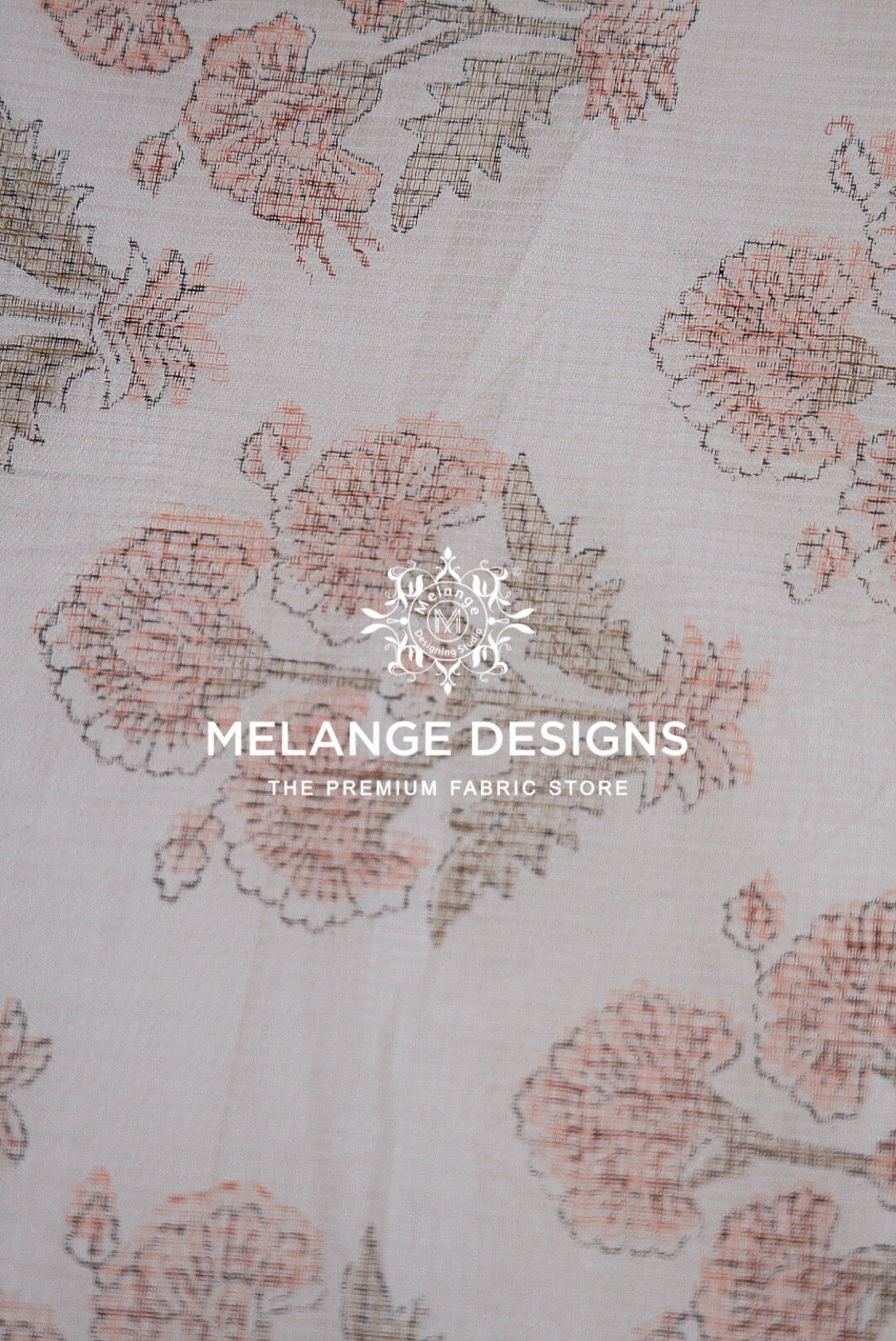 A close-up of floral Printed Cotton Cotta Fabric with a light beige background and dusty pink and muted gray-brown floral pattern. 