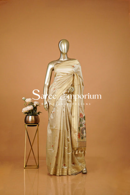Champagne-Gold saree with floral embroidery.